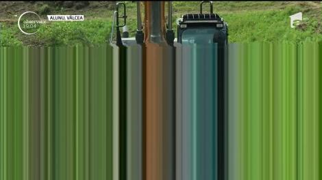 În Vâlcea, o haldă de steril pare de neoprit. A înghiţit deja mai multe case şi hectare întregi de pădure