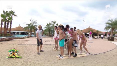 În plină vara, matinalii de la Neatza se dau cu schiurile pe nisip. Invitații, provocare totală: ”Se înaintează cu viteza melcului turbat! Trebuie să ne oprim din acest genocid”