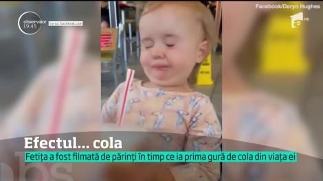 FABULOS. Cum reacţionează o fetiţă după ce bea prima gură de suc acidulat din viaţă ei