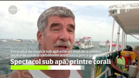 Concert sub apă. S-a întâmplat în Florida, unde peste 400 de curajoşi s-au scufundat în adâncuri pentru a cânta la diferite instrumente muzicale