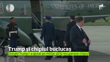 Donald Trump a recuperat de pe jos chipiul luat de vânt al unui puşcaş marin