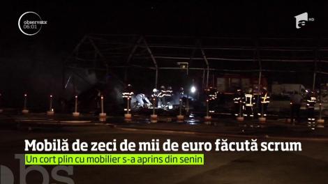 Incendiu violent în parcarea unui supermarket de la marginea Capitalei