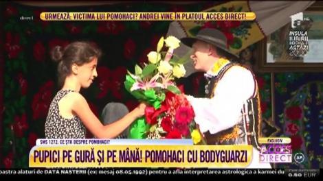 Cristian Pomohaci cu bodyguarzi. Preotul a cam uitat de cele sfinte şi a luat bani grei pentru dedicații! Admiratorii au dat năvală să-l sărute, să-l îmbrățișeze și să-i dea flori