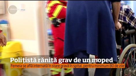 Polițistă accidentată grav de un moped