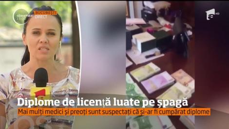 Sute de medici şi preoţi şi-ar fi luat diplomele pe şpagă!