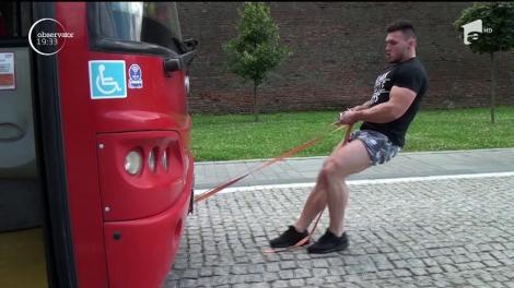 Cel mai tare din parcare! Eusebiu trage după el camioane de zeci de tone