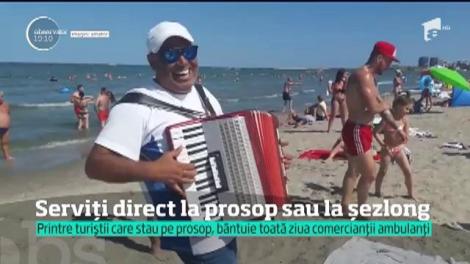 Turiştii de pe litoral serviţi direct la prosop sau la şezlong