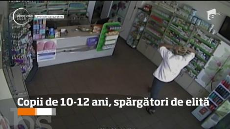 Hoți de elită la doar 10 și 12 ani! Doi puști din Craiova au jefuit în plină zi o farmacie!
