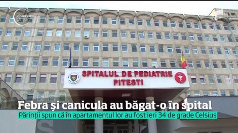 Febra şi caniculă au băgat-o în spital