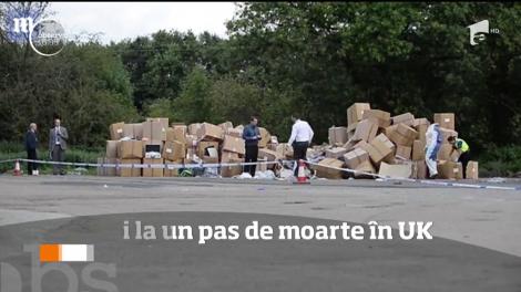 13 români au fost salvaţi după ce au fost găsiţi în remorca unui camion din Marea Britanie