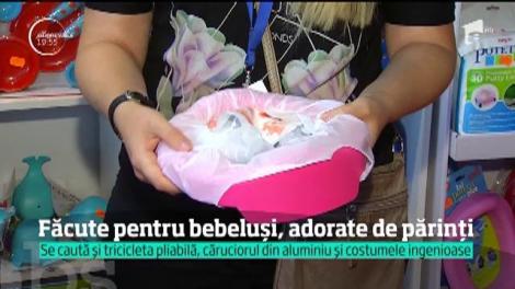 Noua generaţie de bebeluşi poartă haine din materiale folosite de NASA şi se plimbă în cărucioare pliante, inspirate de aeronave