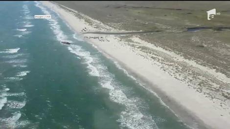 Încă un pescador plin cu migranţi a eşuat pe o plajă românească