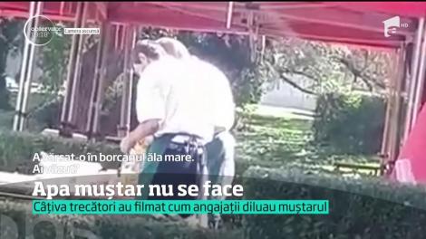 Muştar îndoit cu apă de câţiva ospătari din Târgovişte