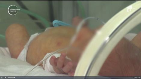Bebeluș de o lună și jumătate, bătut până la comă de propria mamă