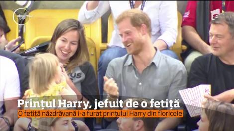 Prinţul Harry, jefuit de o fetiță!