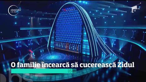 O familie încearcă să cucerească Marele Zid