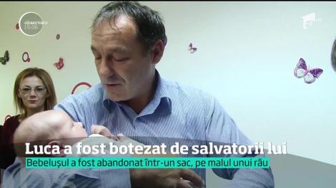 Luca, băiețelul aruncat de mama lui într-un sac, a fost botezat de salvatorii lui