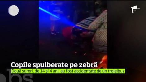 Două surori din Baia Mare, de 4 şi 14 ani, au fost spulberate, pe trecerea de pietoni, de un troleibuz