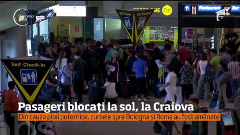 Ploaia a creat probleme majore la Craiova, acolo unde pasagerii zborurilor de Bologna şi de Roma sunt blocaţi
