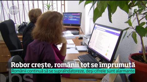 ROBOR crește, românii tot se împrumută. Analiştii trag un semnal de alarmă şi spun că acestă economie artificială e o bombă cu ceas