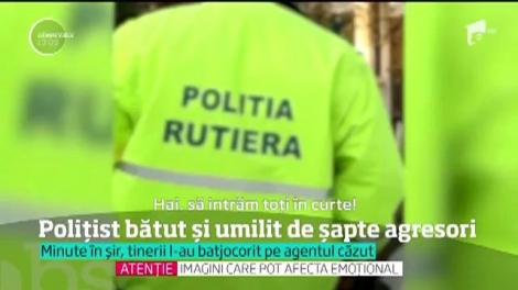 Un poliţist a fost rupt în bătaie şi filmat chiar de către agresori. Bătăuşii l-au luat peste picior şi l-au provocat să-şi folosească arma