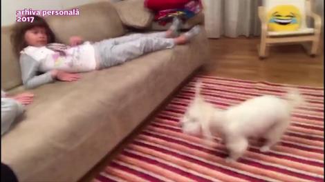 Imagini din arhiva personală. Reacţia fetelor lui Morar când au primit în dar un câine