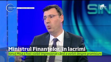După o zi dificilă, ministrul finanţelor s-a emoţionat până la lacrimi când a vorbit despre promisiunile făcute românilor