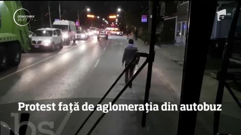 Protest inedit în Canada. Furioasă de aglomeraţia din autobuz, o femeie s-a dat jos din vehicul şi a încercat să îi blocheze calea