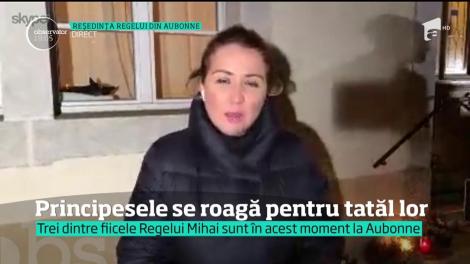Doliu şi la reşedinţa din Aubonne, unde fiicele îndoliate se îmbrăţişează şi spun rugăciuni la căpătâiul tatălui