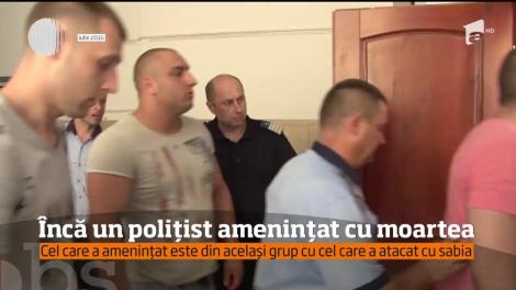 Încă un poliţist ameninţat cu moartea