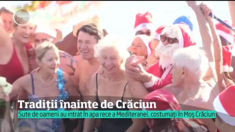 Tradiții înainte de Crăciun. 300 de curajoşi au făcut baie în Nisa