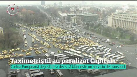 Este război între firmele de taxi şi şoferii care practică ride-sharing