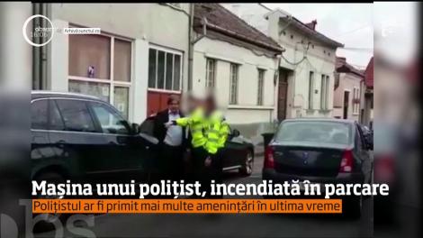 Mașina unui polițist, incendiată în parcare. Acesta ar fi primit mai multe amenințări în ultima vreme