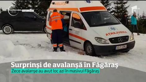Doi turişti, surprinși de avalanșă în Făgăraș