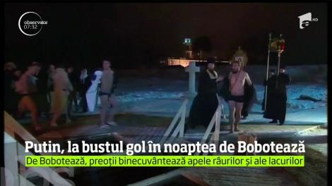 Vladimir Putin a făcut baie în apele aproape îngheţate ale unui lac de Boboteaza pe rit vechi