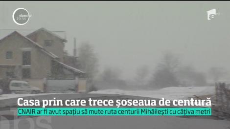 O familie din Mihăileşti, judeţul Giurgiu, s-a trezit cu șoseaua de centură în curtea lor