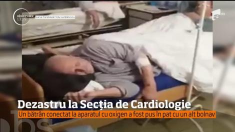 Dezastru la secţia de cardiologie a spitalului din Bârlad! Un bătrân conectat la aparatul cu oxigen a fost pus în pat cu un alt bolnav