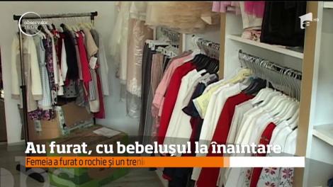 S-au folosit de un bebeluş ca să poată fura dintr-un magazin haine pentru copii