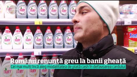 Românii renunţă cu greu la banii gheaţă