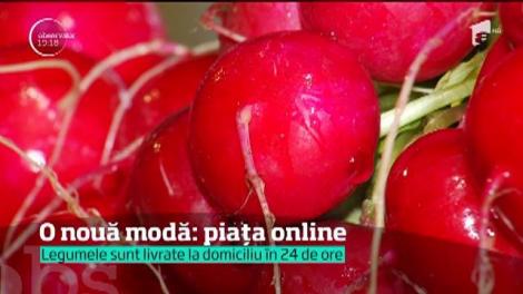 În era tehnologiei, piaţa se face online. Iar agricultorii care livrează acasă coşul cu legume bio au un mare succes