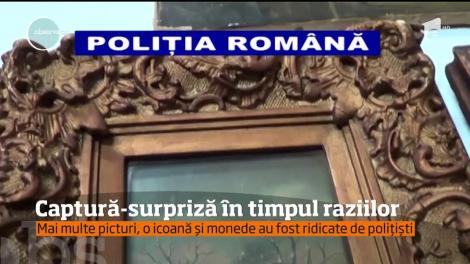 Trei picturi pe pânză, o icoană pe lemn, monede, dar şi o baionetă şi un pistol, câteva din obiectele ridicate de poliţiştii din Galaţi în timpul unor percheziţii