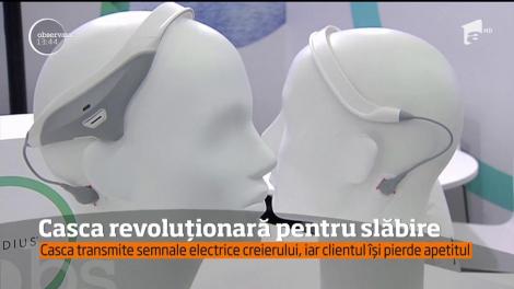 Persoanele supraponderale îşi pot lua adio de la kilogramele în plus! O companie britanică a inventat prima cască pentru slăbit. Vei fi ca biscuitele-n dungă!