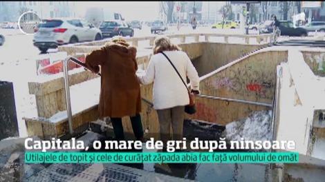 Capitala, o mare de gri după ninsoare