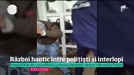 Lupte corp la corp, ţipete şi ameninţări cu pistolul. Avem noi imagini de la intervenţia în forţă din vila interlopului din Bucureşti!