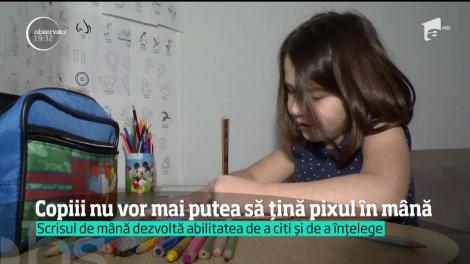 Telefonul şi tableta daunează grav scrisului! Copiii nu vor mai putea să ţină pixul în mână!