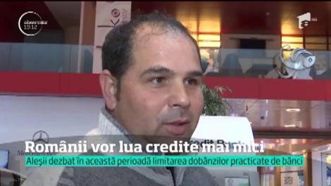 Românii vor lua credite mai mici. BNR vrea să micşoreze gradul de îndatorare