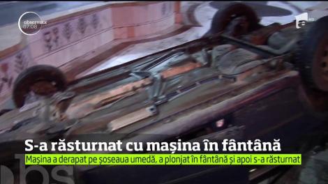 Accident spectaculos în Capitală! S-a răsturnat cu mașina în fântănă