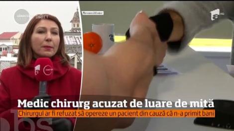 Medic chirurg acuzat de luare de mita