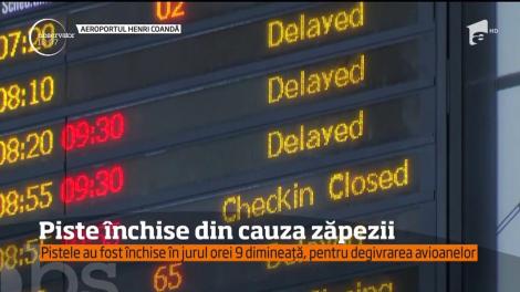 Cel mai mare aeroport din ţară a fost închis din cauza ninsorii