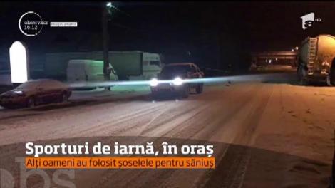 Cu snowboardul pe străzile din Motru!